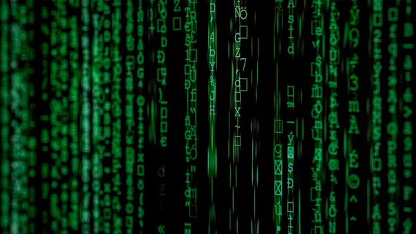 Green computer code on a dark screen representing cybersecurity and anti-blocking techniques