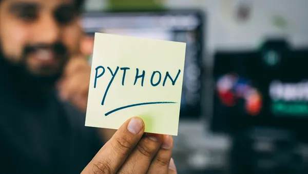 Computer screen showing Python code for a web scraping script
