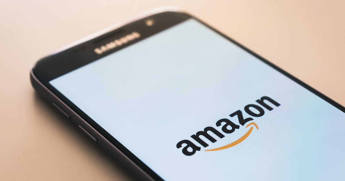 Amazon product price monitoring dashboard on laptop screen